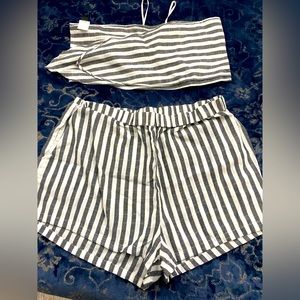 Shorts and top, top ties around you